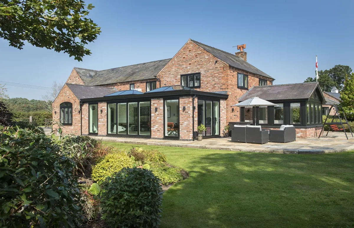 Aluminium windows and doors across a garden elevation