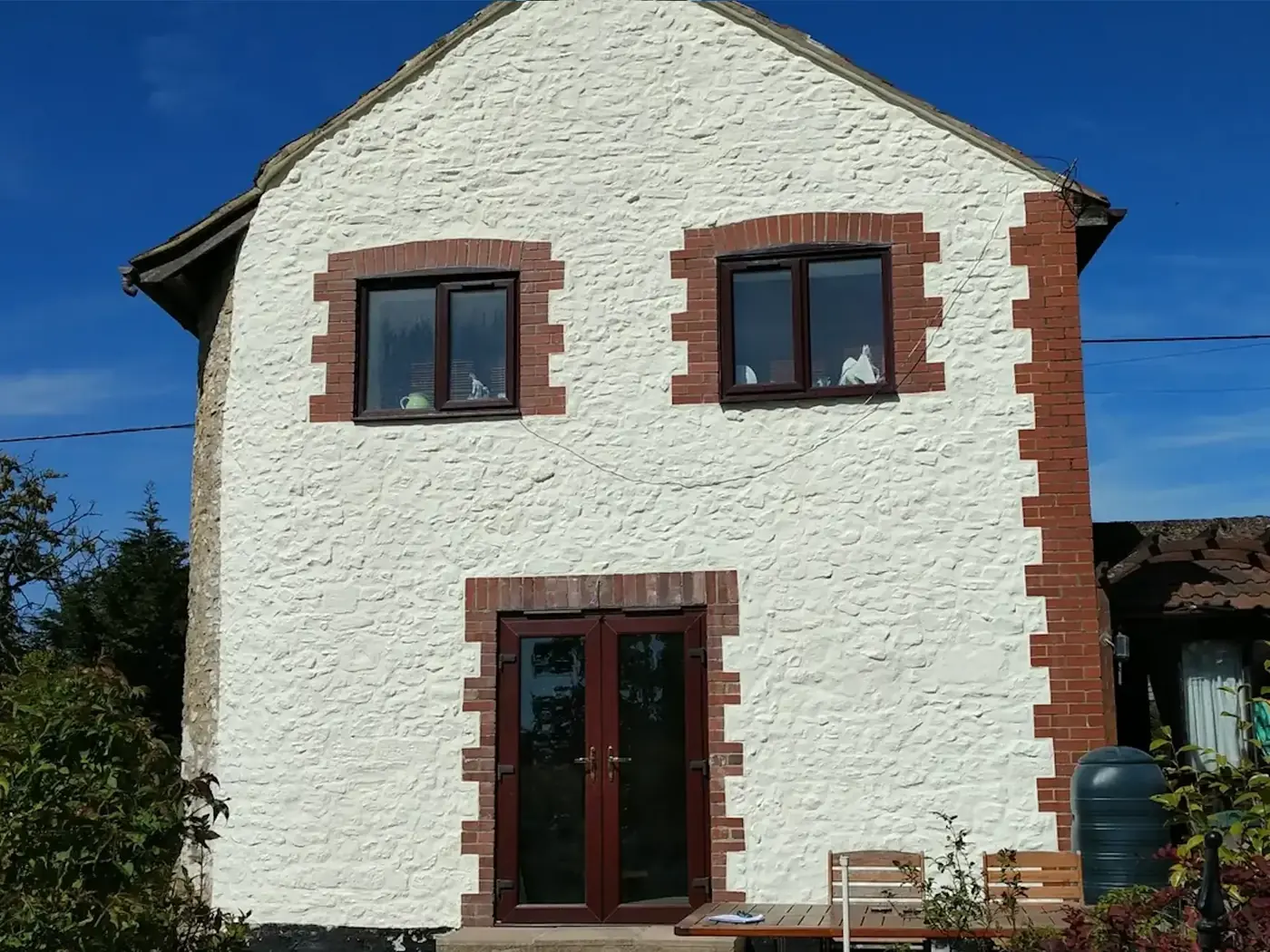 Masonry treated with a clear crème
