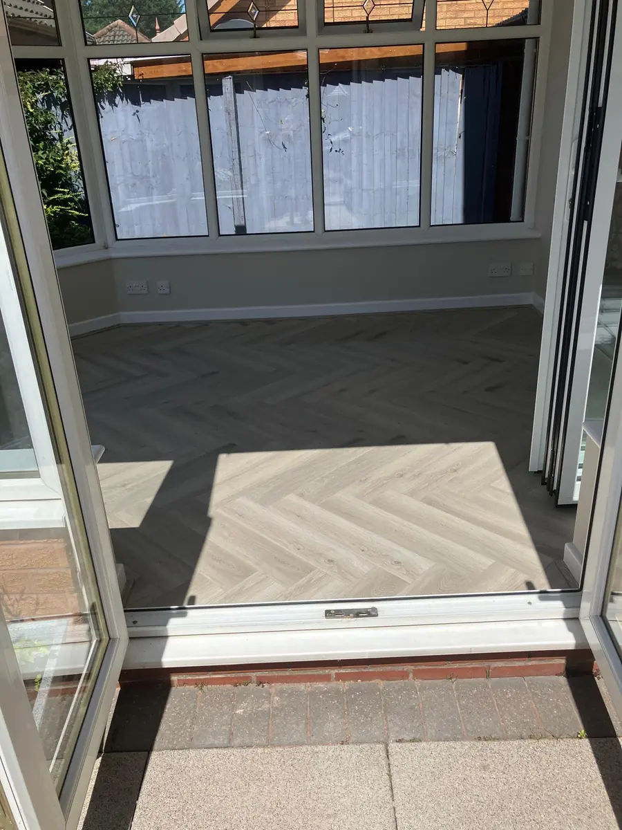The finished room looking out through the new bifold doors