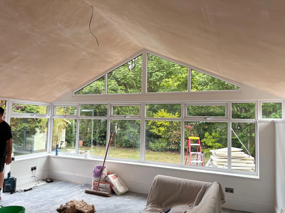 The new gable window seen from inside the plastered conservatory