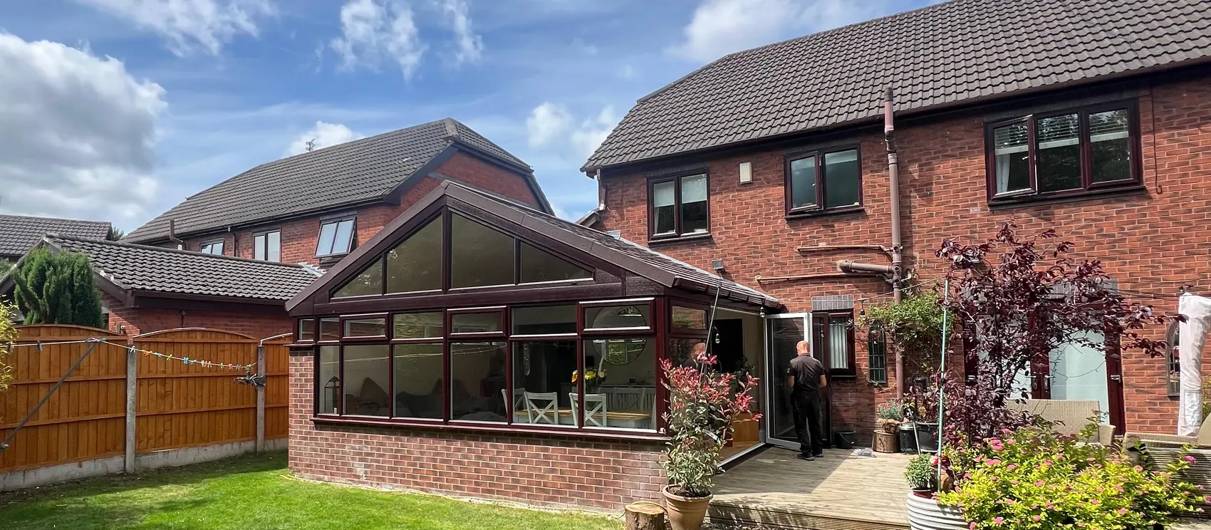 The finished conservatory seen from across the garden