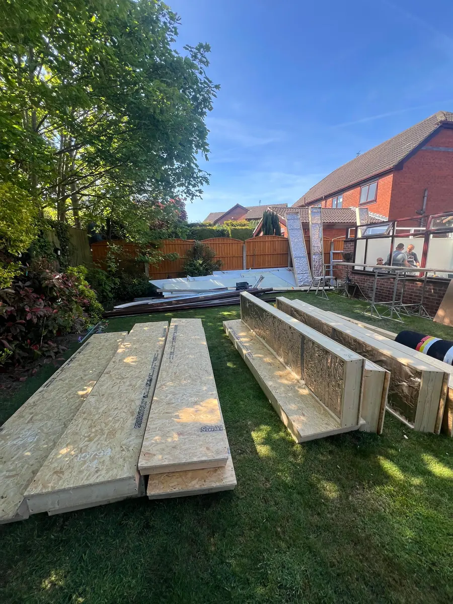 New Icotherm insulated roof panels stacked ready to be fitted
