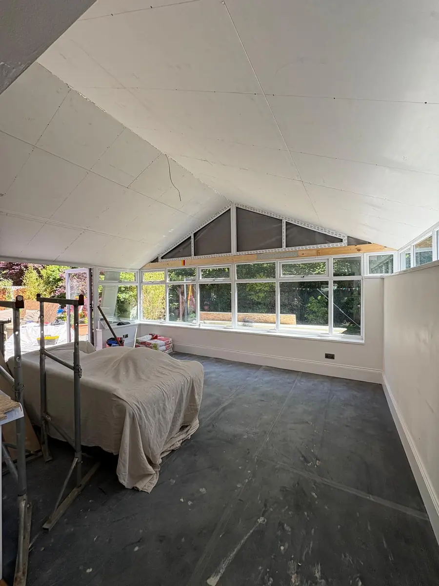 The vaulted ceiling plastered and ready for decorating