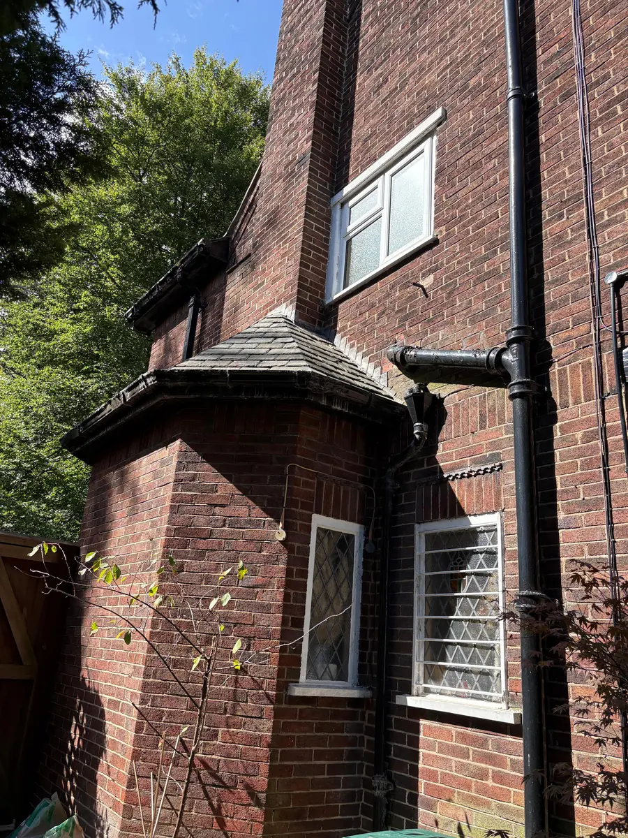 Repaired brickwork and renewed rainwater goods