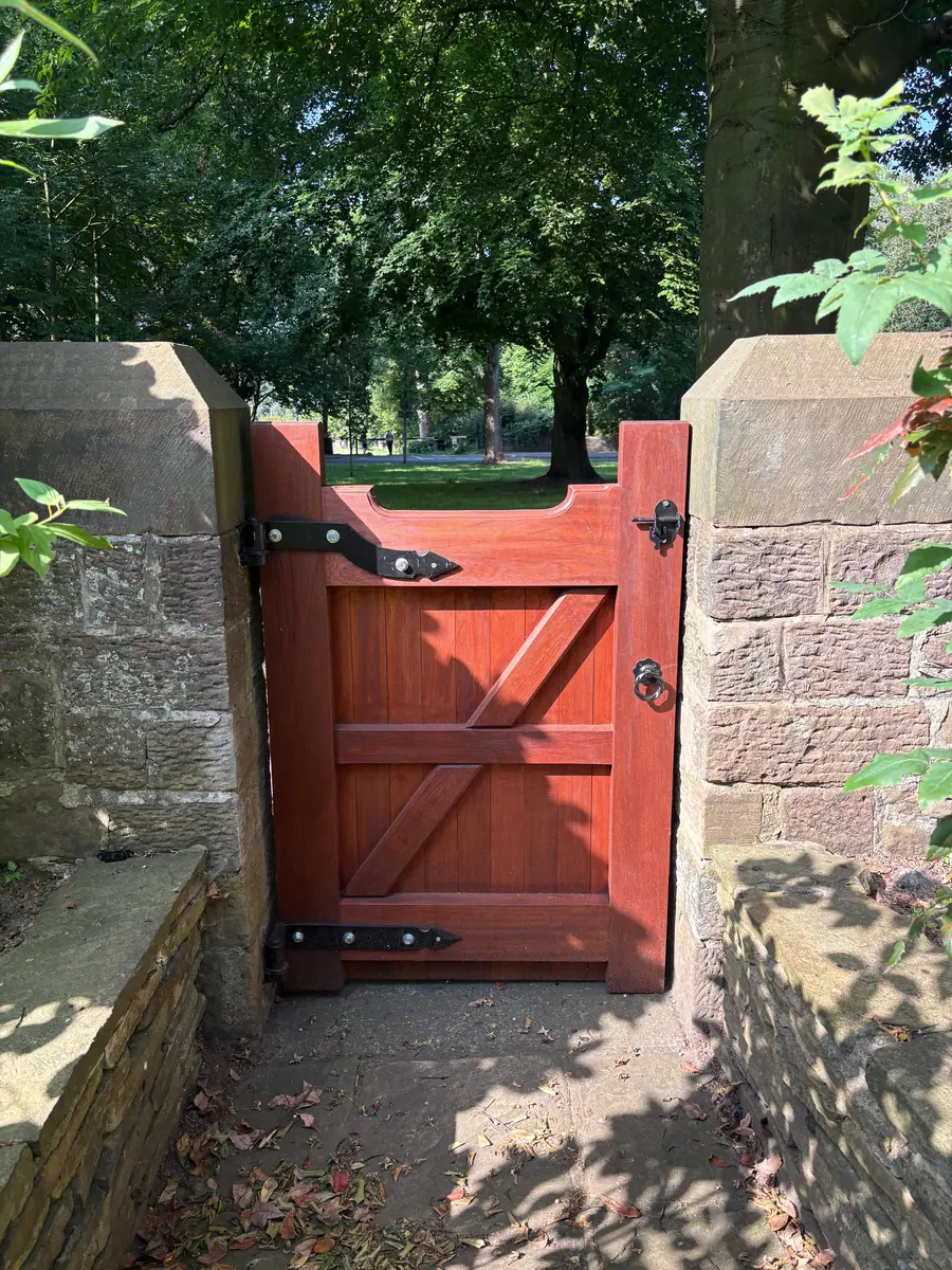 The view through the open gateway to the park beyond