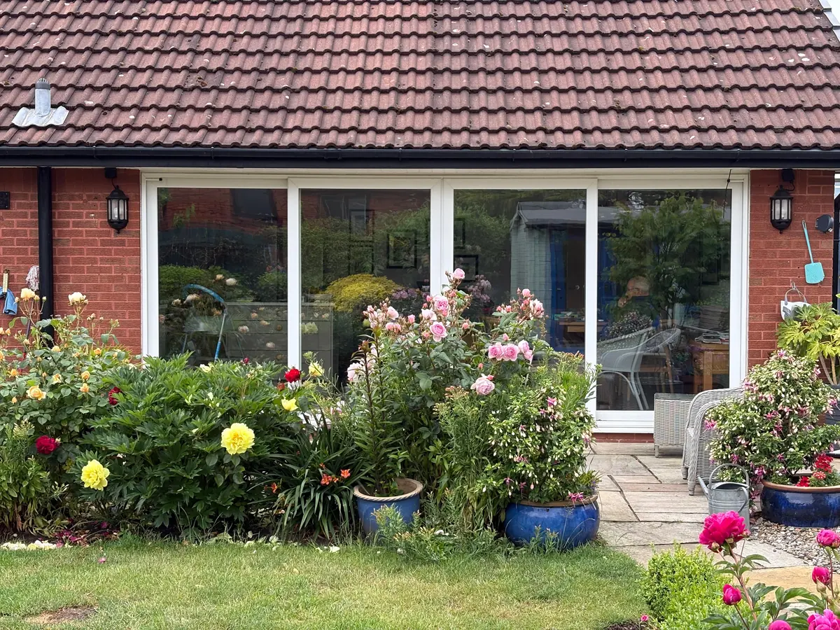 The original white patio doors before replacement