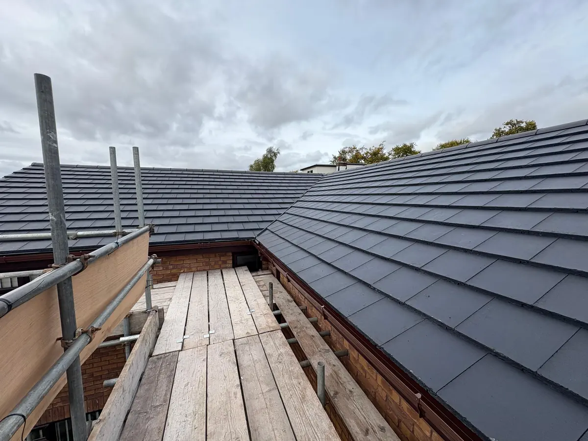 The finished ridge and new roof covering