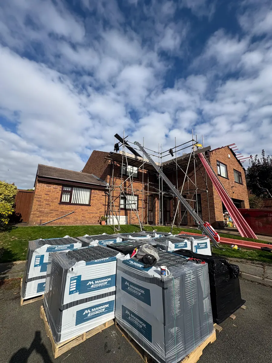 Pallets of new roof tiles waiting to go up