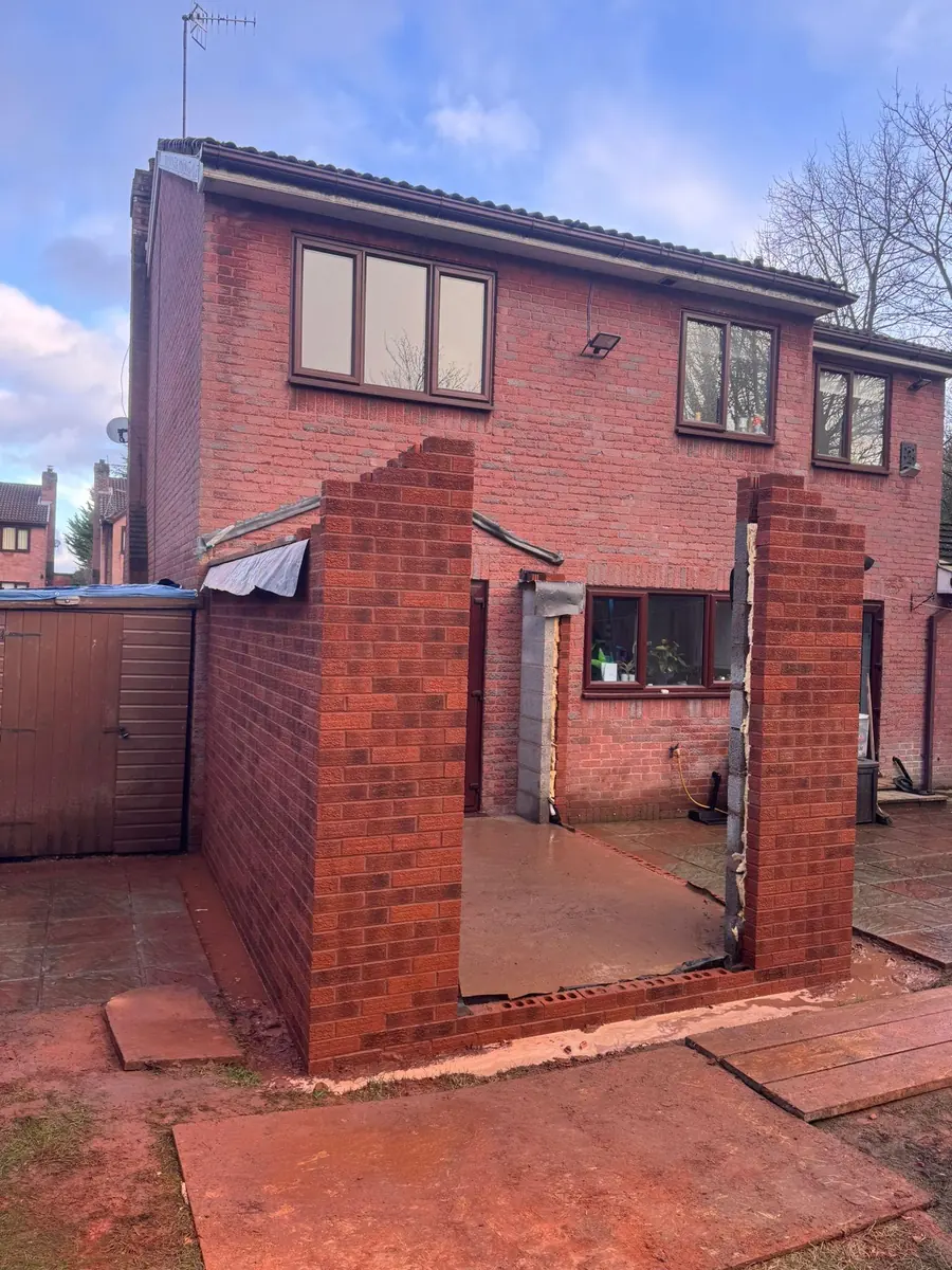 New brick piers and blockwork up on the new footprint