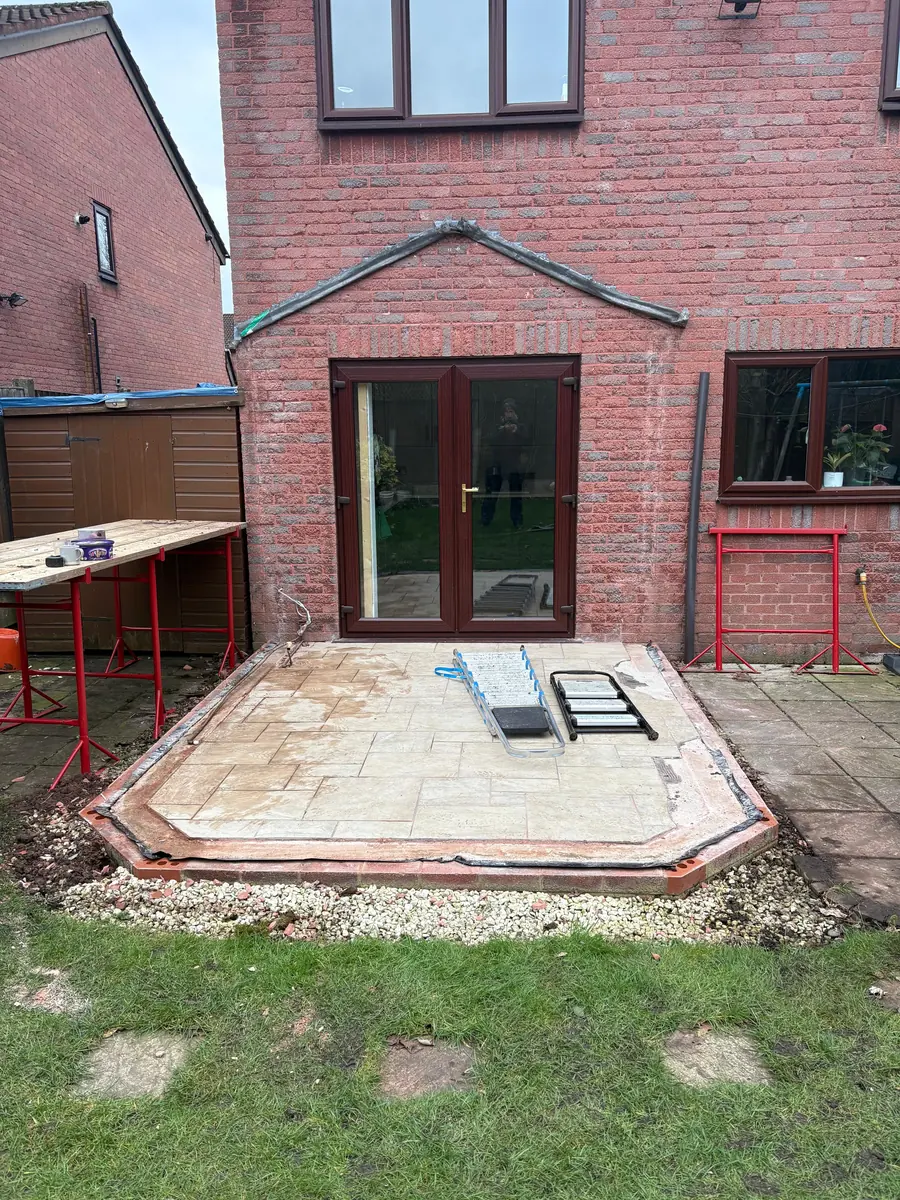 The conservatory taken down and the base cleared