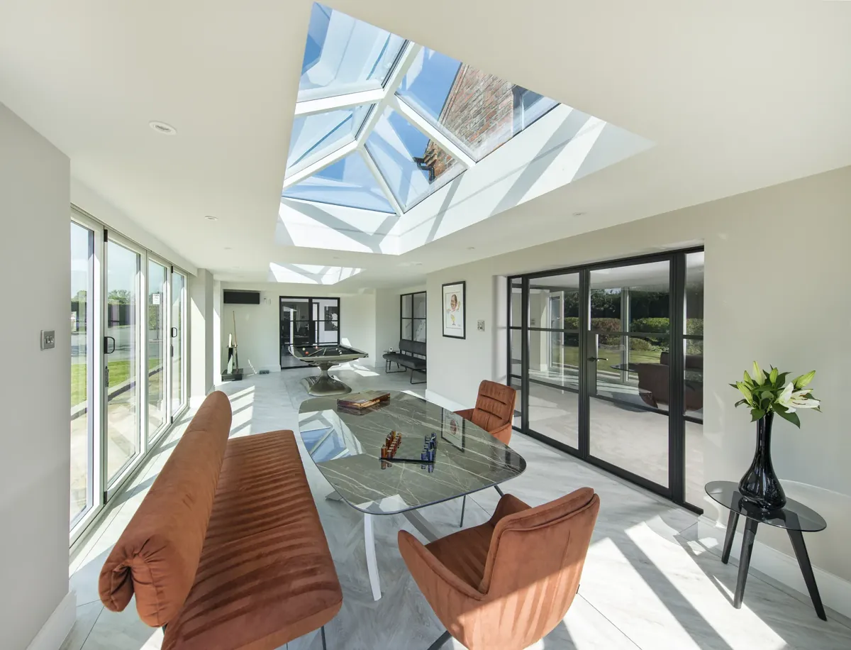 A wide view of a roof lantern over a dining area