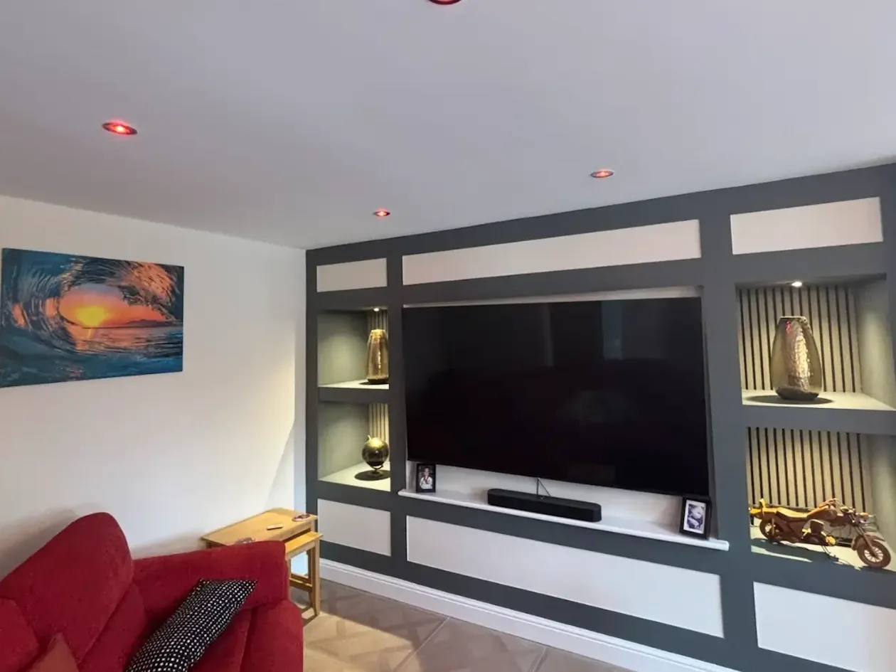 A media wall with recessed lighting