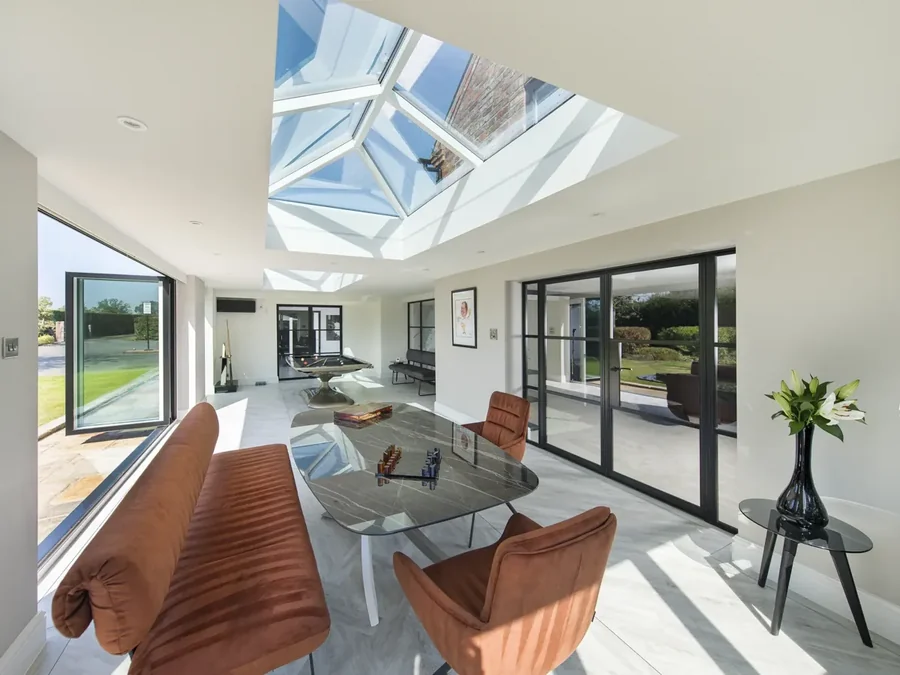 A glazed roof lantern over a dining area
