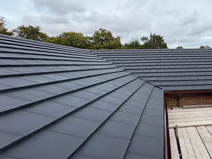 A full house re-roof in new dark tiles
