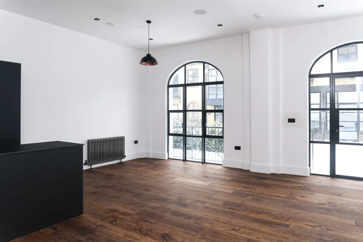 Steel-look glazing across an open-plan room